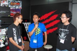 #001Υͥ/TGS 2012Mad Catz֡ǹԤ줿֥륭СVפΥӥޥå㥤˥󥰥ǥݥvs.ȤࡼӡǺܡDΥå